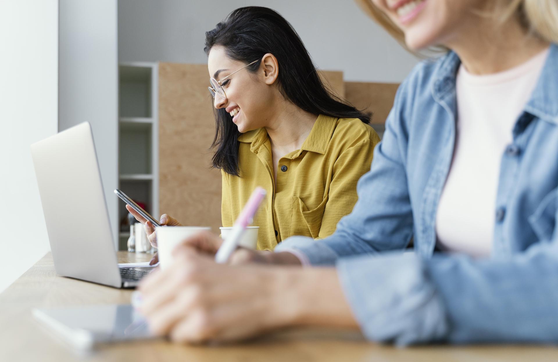 businesswoman-taking-notes-her-colleague businesswoman-taking-notes-her-colleague